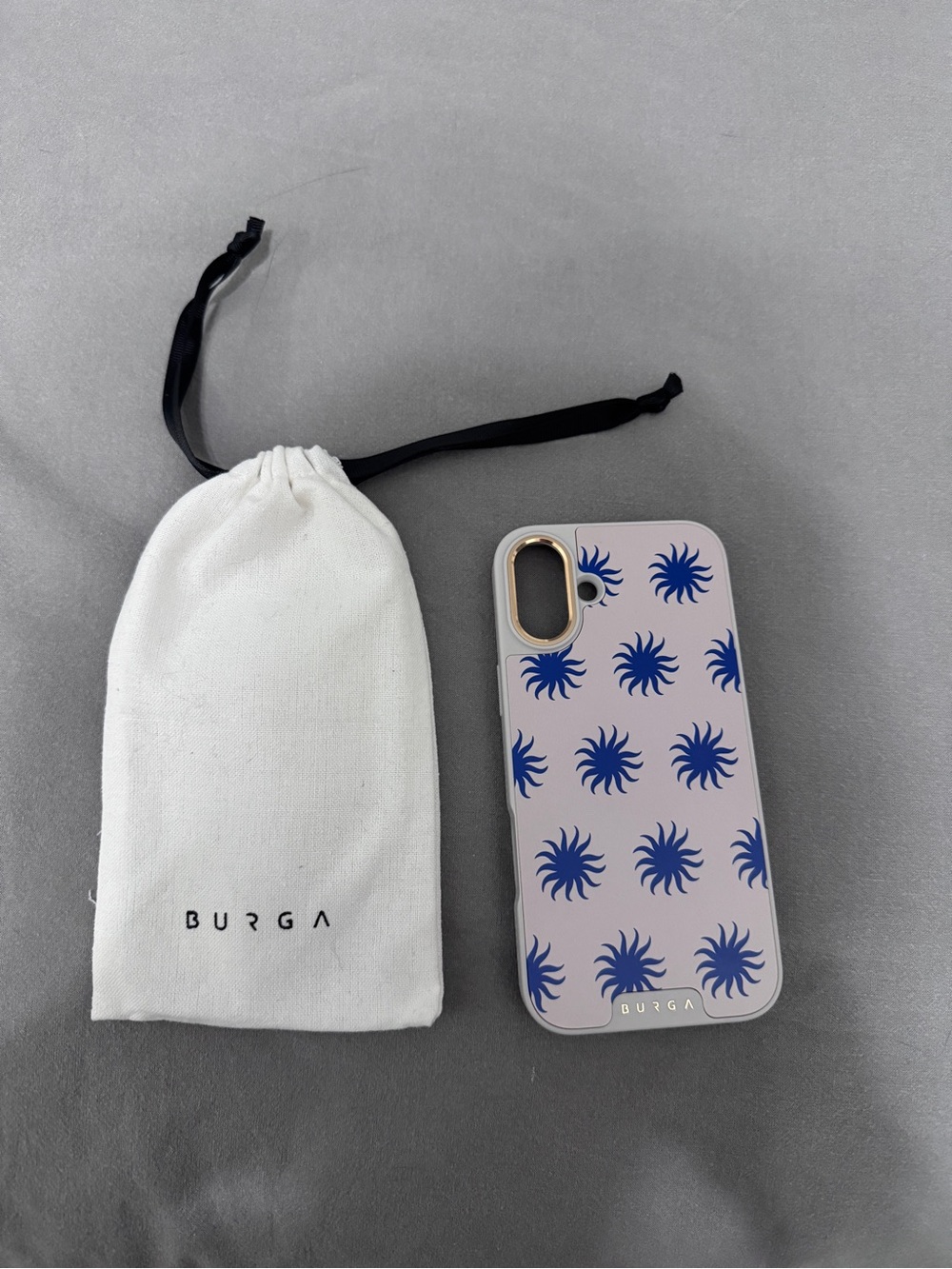 BURGA Pink Phone Case with Blue Sunburst Pattern